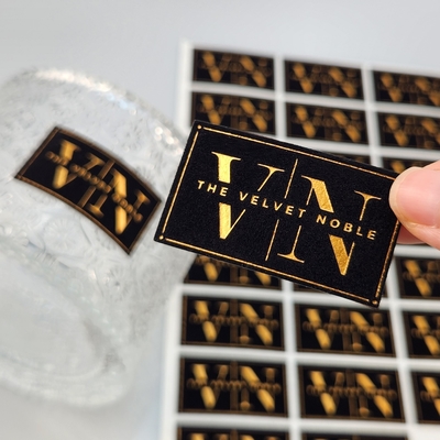ซื้อ High Quality Customized Embossed UV Gold Foil Printing Card Press Gold Art Paper Velvet Gold Stamping Label Sticker for Perfume & Party  online manufacture